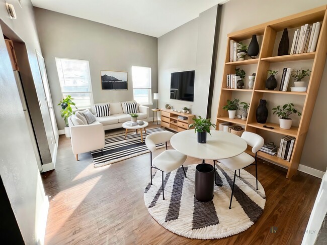 Experience modern comfort in this welcoming living room, ideal for stylish gatherings. - Williams Street