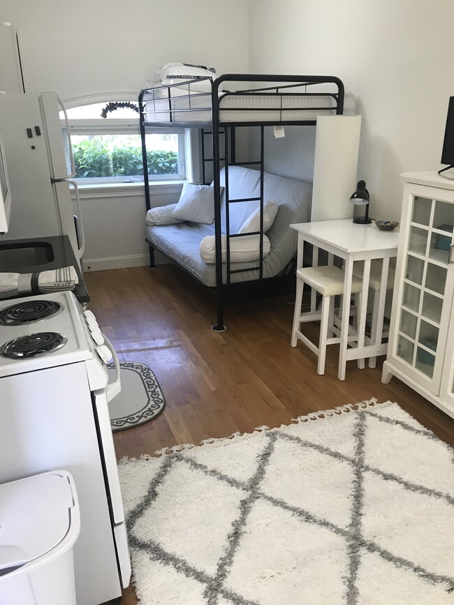 Floor through unit has the feel of a tiny home. with efficiency kitchen - 4 Center Ct