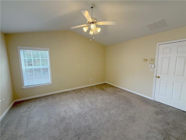 Building Photo - 4680 Creekside Villas Way