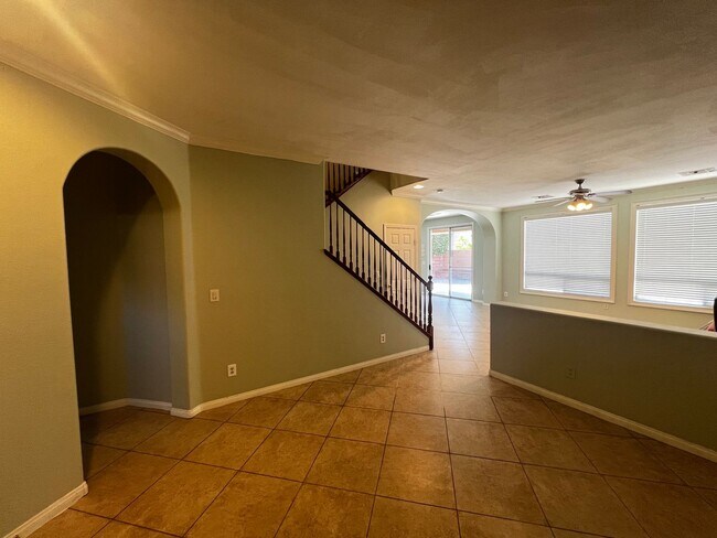 Building Photo - Spacious 4-Bedroom Mountains Edge Home with Downstairs Suite, Balcony & Covered Patio