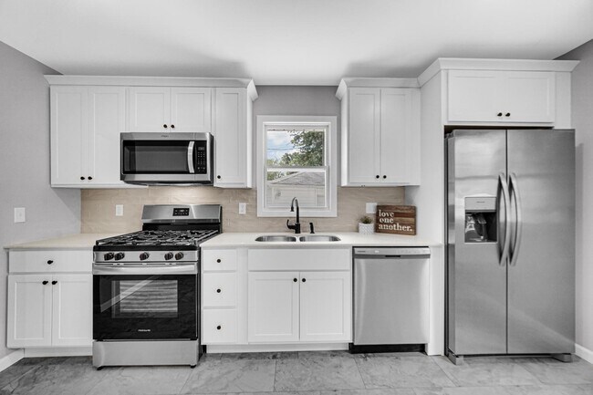 Building Photo - 3413 W 77th Ave