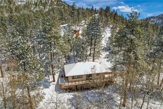 Building Photo - GORGEOUS HOME IN COAL CREEK CANYON ON 4.85 ACRES! RENT, BUY, OR RENT TO OWN!