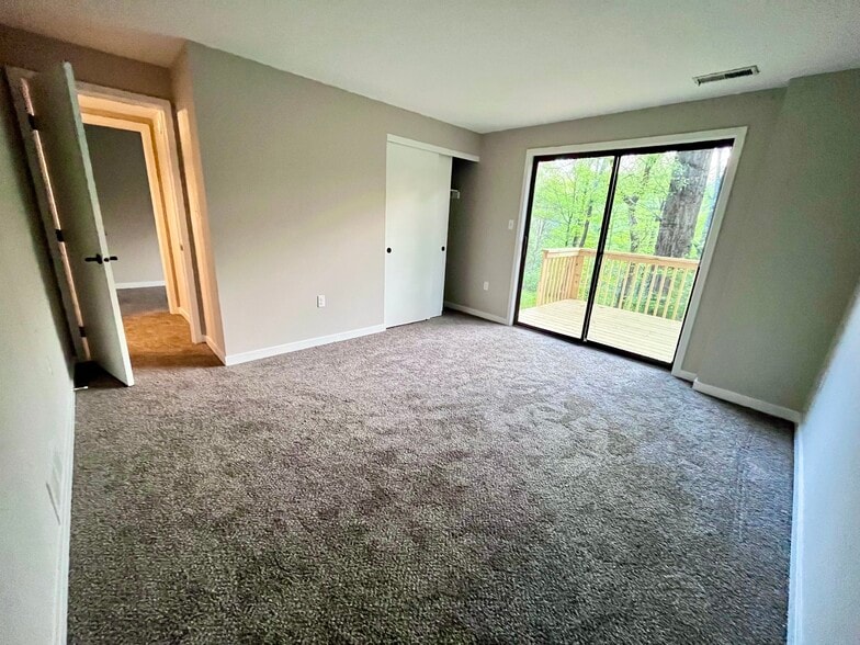 Downstairs bedroom with walk out deck - 10241 Hightower Ct
