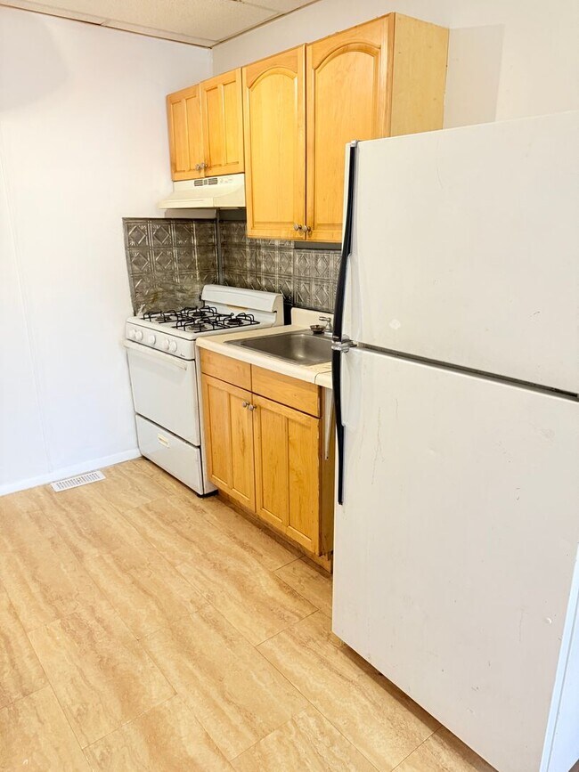 Building Photo - 4BR / 2BA Home – Charles Village – $2,700/mo