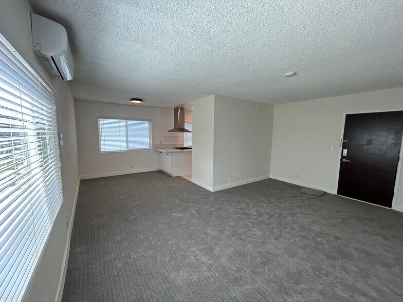 Living Room into Dining Area - 325 S Doheny Dr