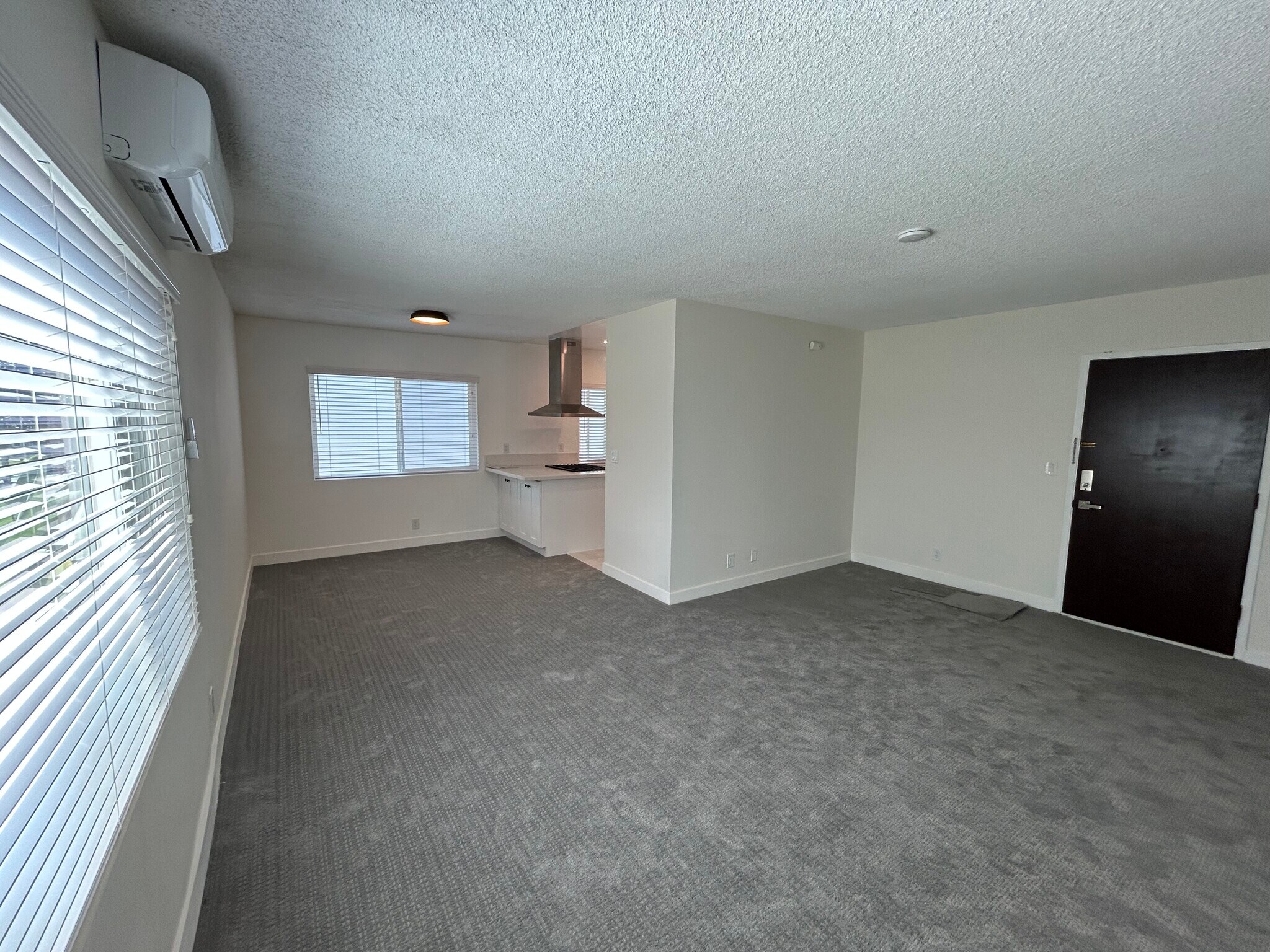 Living Room into Dining Area - 325 S Doheny Dr