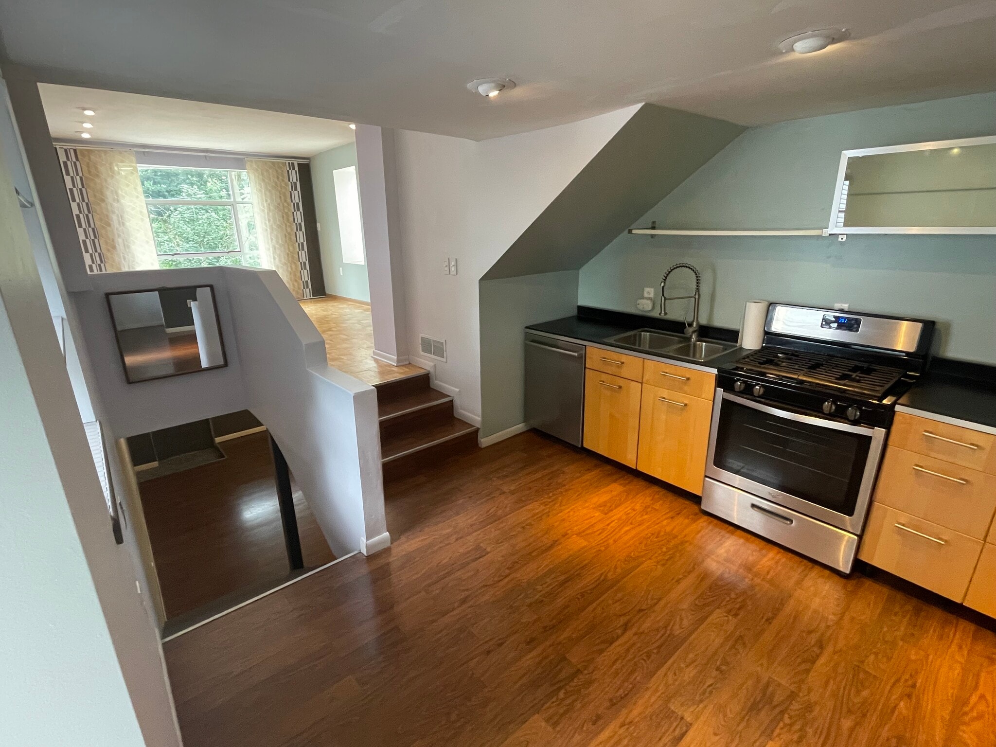 Easy access to living room or lower level from the kitchen - 227 Wilbert St