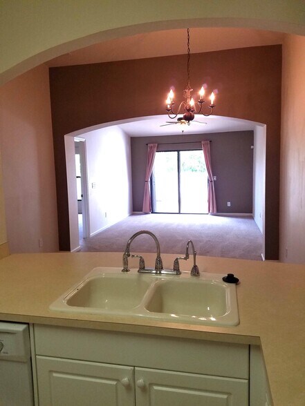 View of Living Room from Kitchen - 1140 Luminary Cir