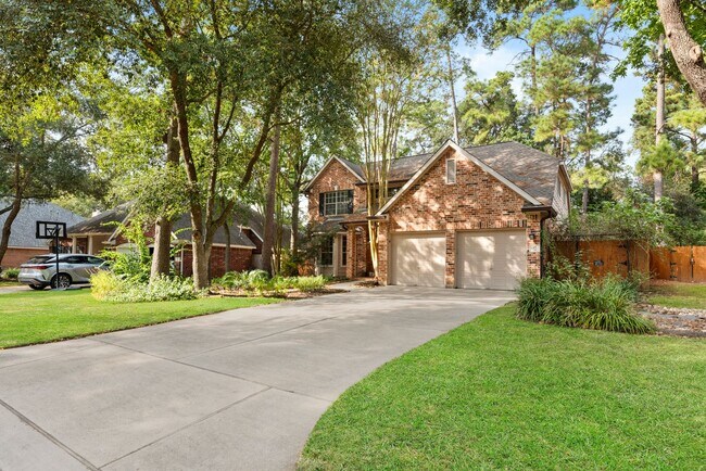 Building Photo - The Perfect Woodlands Retreat: Steps from ...