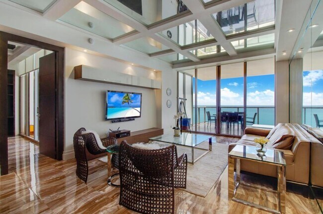 Building Photo - 9703 Collins Ave