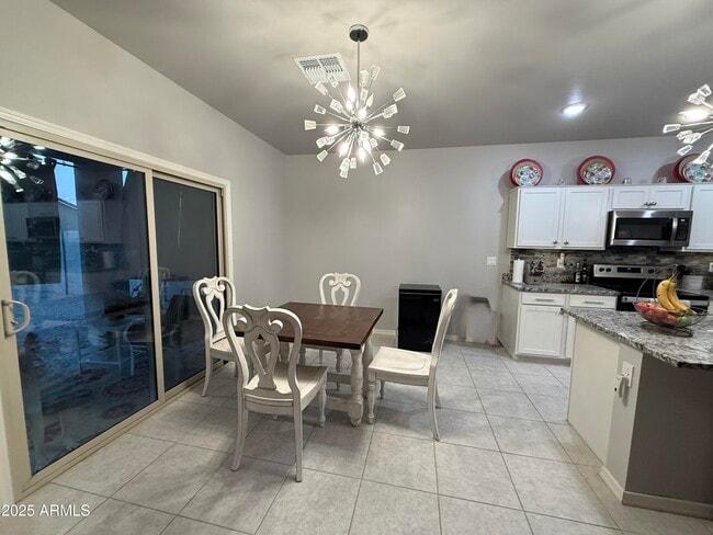 Building Photo - 6014 E Helios Dr