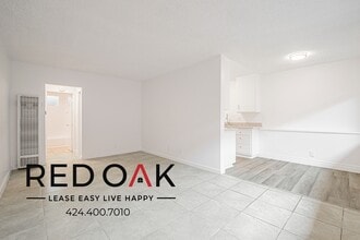 Building Photo - 15901 S Vermont Ave