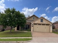 Building Photo - Available Now: 4 bedroom house