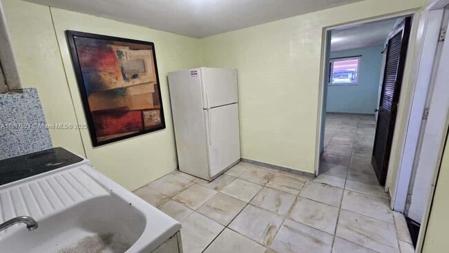Building Photo - 701 Tamiami Canal Rd