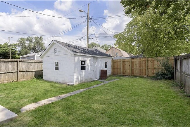 Outside Offers Tons of Privacy With a Fully-Fenced Yard and 1-Car Garage - 1137 Saint Peter St