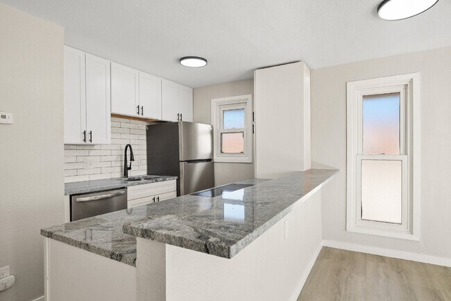 Building Photo - 2-Bedroom Gem with Granite Countertops Available in May