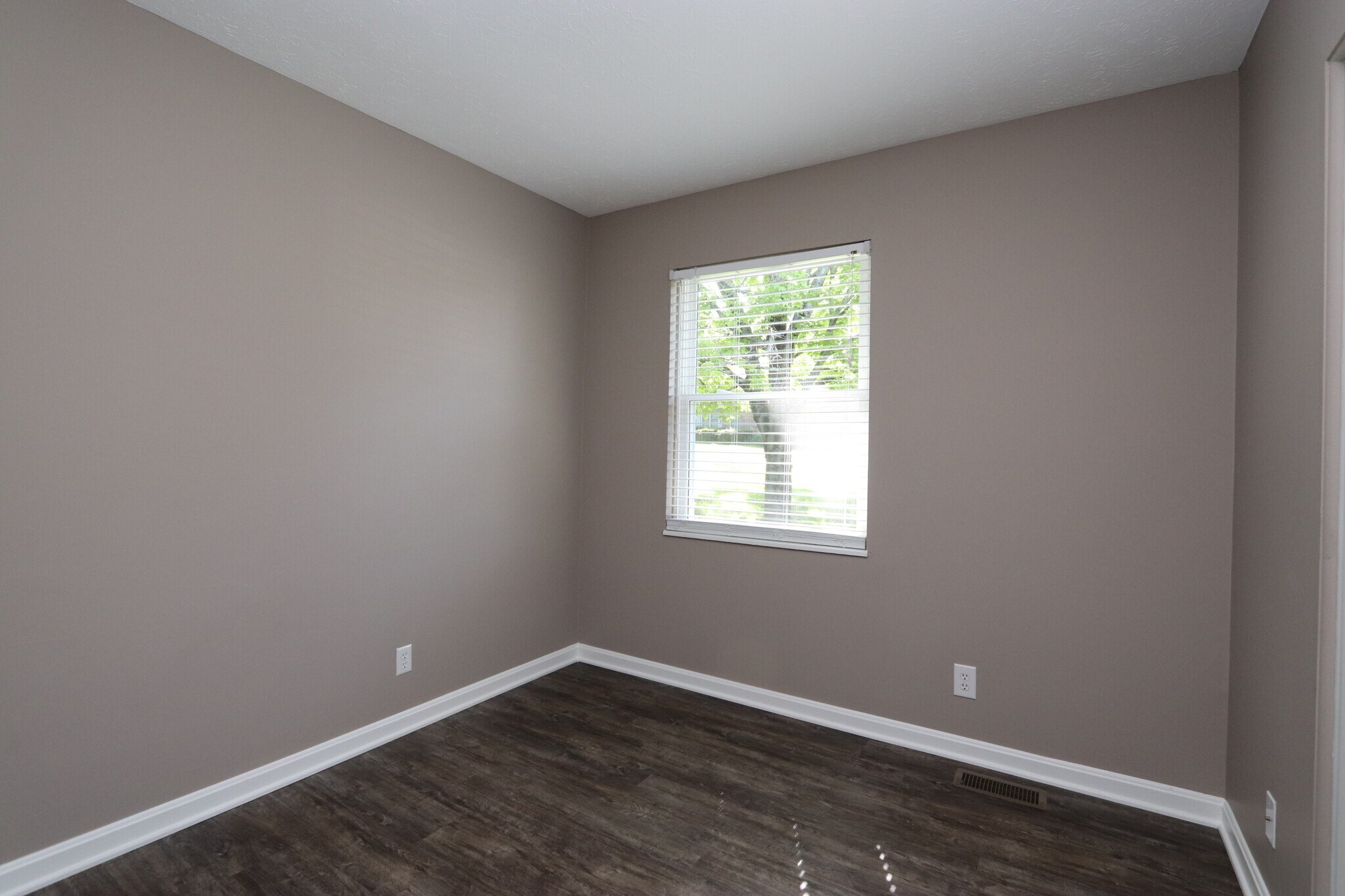 Building Photo - 6810 Village Green Blvd