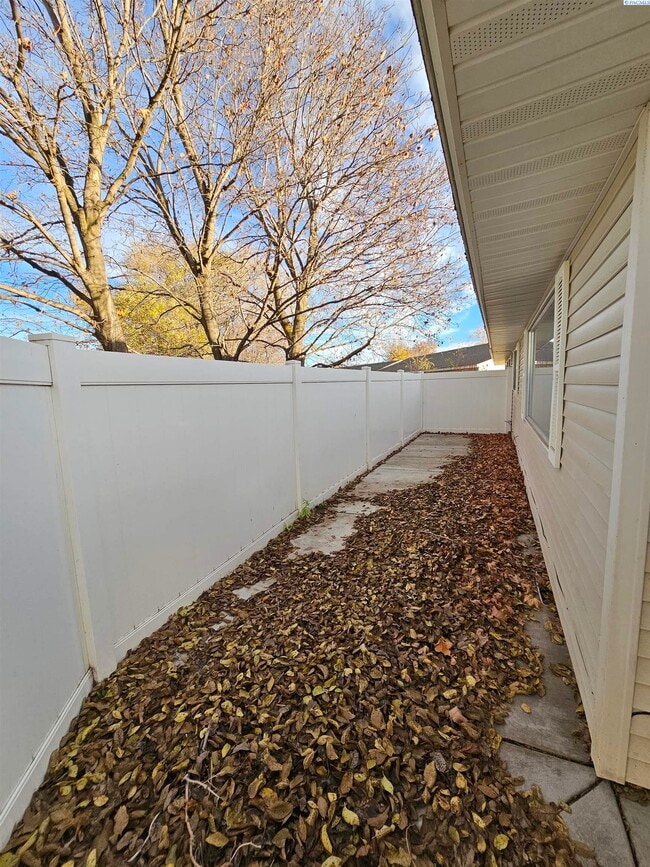 Building Photo - Completely Remodeled Condo; Very Private & Quiet