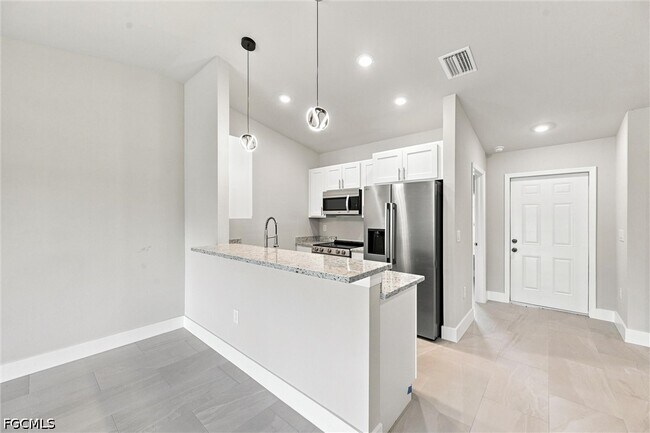 Building Photo - 736-738 Gilbert Ave S