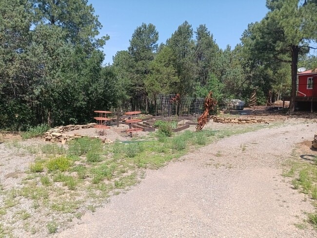 Building Photo - COZY HOME IN THE BEAUTIFUL TOWN OF TIJERAS | Showings available NOW!!