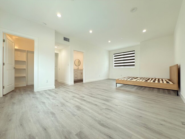 Building Photo - Chic Modern Living in Panorama City – 4 Be...