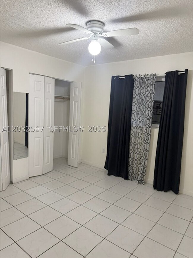 Building Photo - 10000 NW 80th Ct
