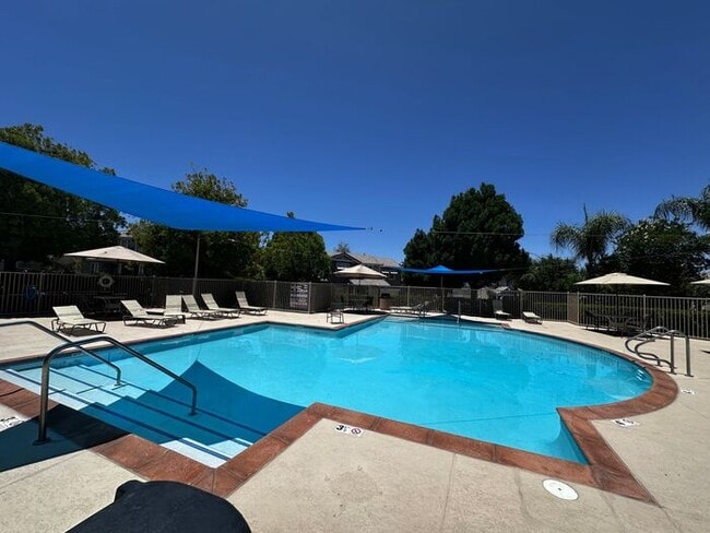 Building Photo - Nestled in a Quiet  Peaceful Valencia Community is ...