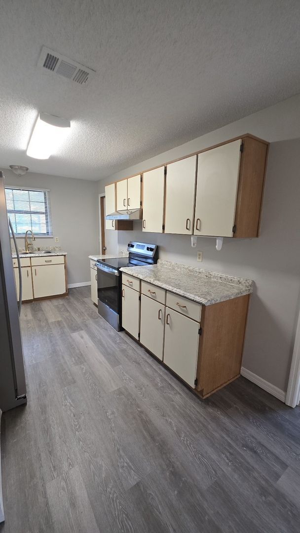 Building Photo - Palm Coast 4 Bedroom 2 Bath in the W Section