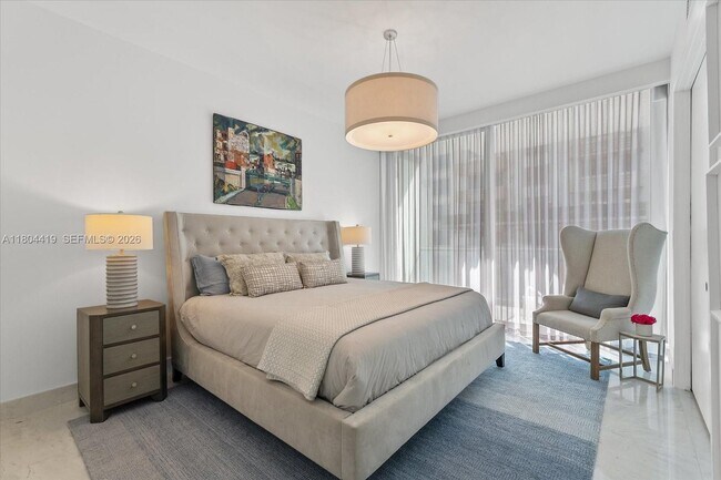 Building Photo - 10201 Collins Ave