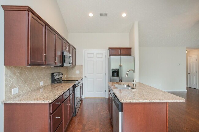 Building Photo - Single-level 2-bed, 2-bath townhome in 55+ community with pool, clubhouse, fitness center and gro...