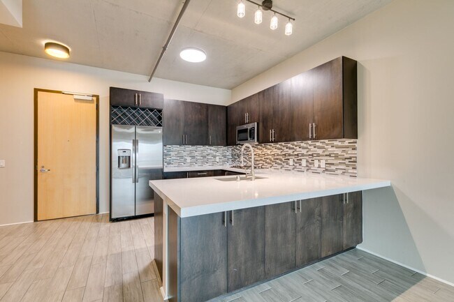 Building Photo - Modern High-Rise Living at Juhl with City Views