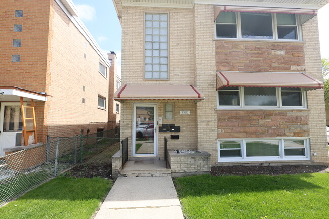 Building Photo - 5501 N Mango Ave