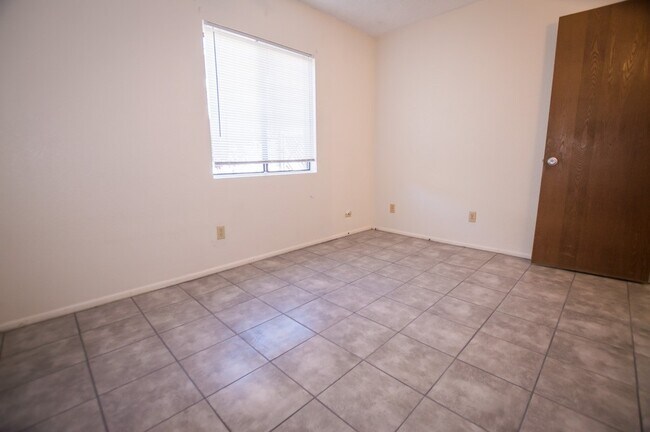 Building Photo - Welcome to this delightful 3-bedroom, 2-ba...