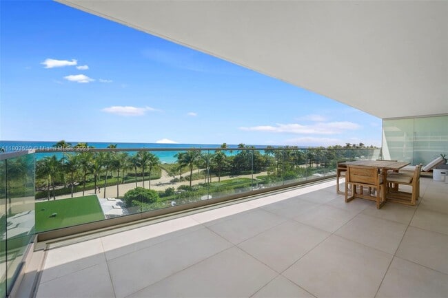 Building Photo - 10203 Collins Ave
