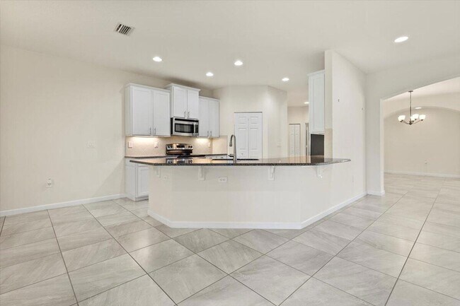 Building Photo - 12133 SW Aventino Dr