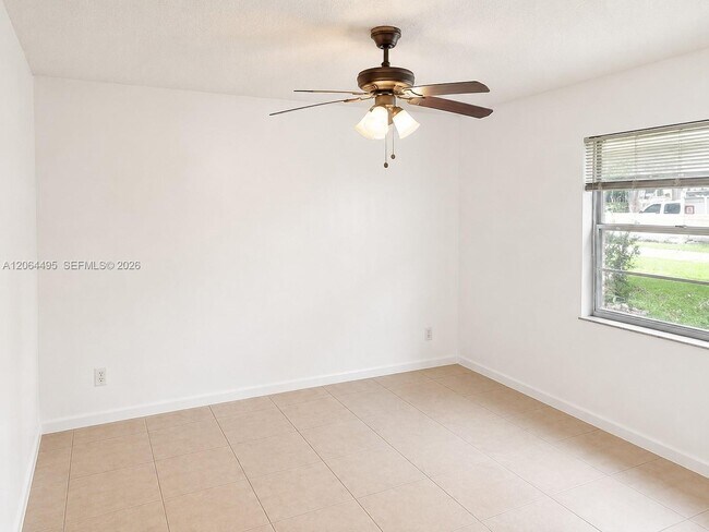 Building Photo - 8750 Royal Palm Blvd