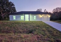 Building Photo - BRAND NEW 3/2/1 IN GREENBRIAR-LEHIGH ACRES