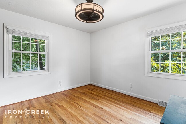 Building Photo - Beautifully Updated Three-Bedroom with Koi...