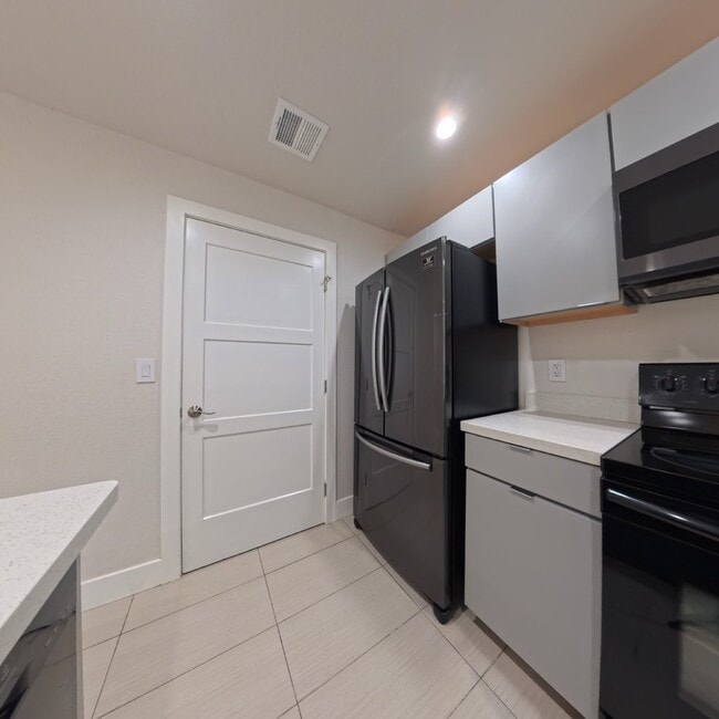 Building Photo - Highly Remodeled | Customer Closets | Gated Community