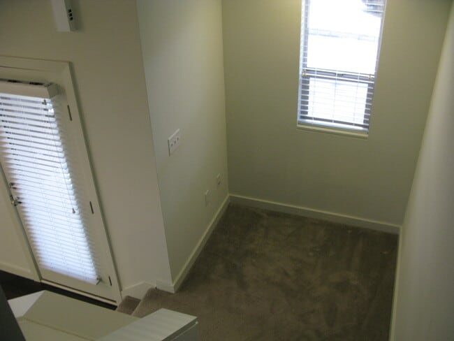 Building Photo - Modern End Unit 3 Bedroom Townhome with Solar.