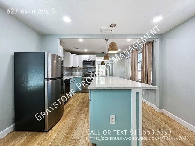 Building Photo - 627 64th Ave S