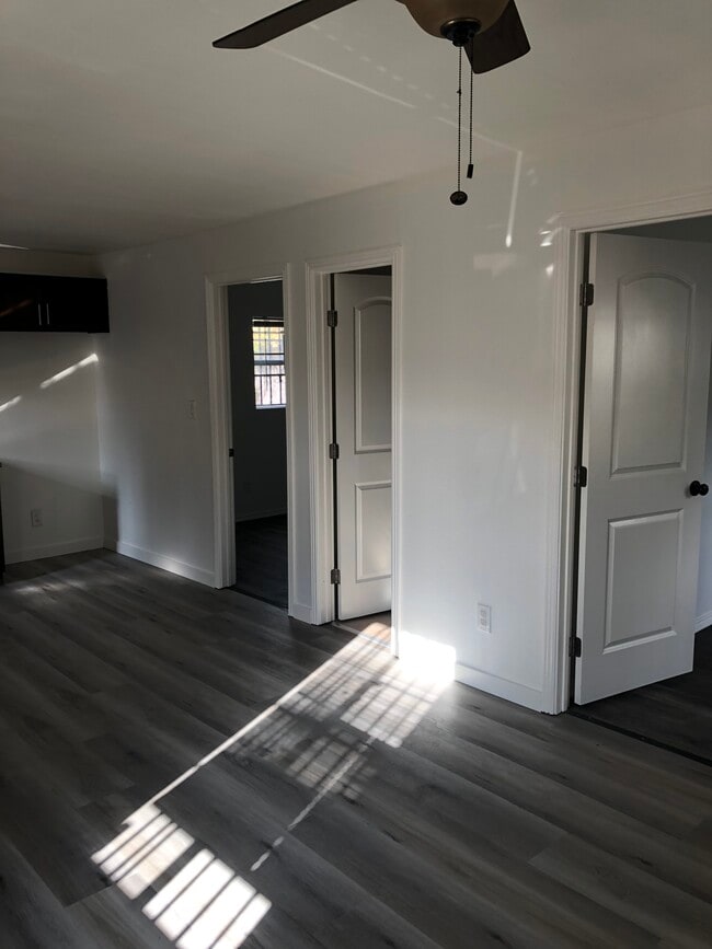 Front room showing doors to bedrooms and bathroom - 345 W 76th St