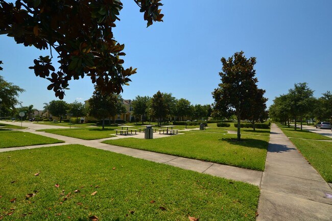 Building Photo - Beautiful 3/2 home near Lake Nona ~ Fenced In Yard ~ LVP & Tile Flooring ~ Community Pool!
