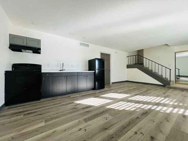 Building Photo - PRICE REDUCED! Utilities Included – Upgraded 2-Bedroom Duplex Near UNLV