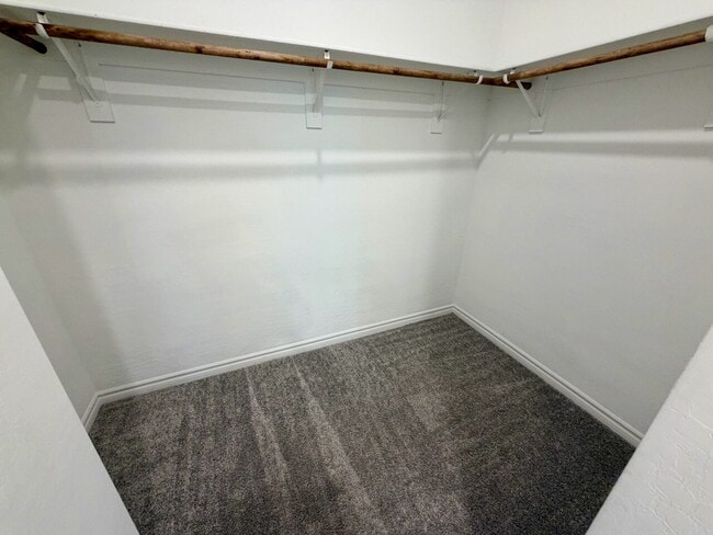 Building Photo - GATED 3 BED 2.5 BATH TOWNHOME WITH 2-CAR GARAGE, COVERED PATIO & COMMUNITY POOL