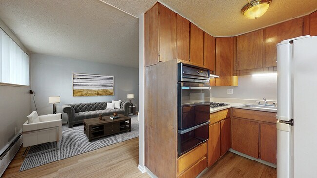 Explore the charm of this cozy apartment with a touch of modern elegance. - Harmony Apartments