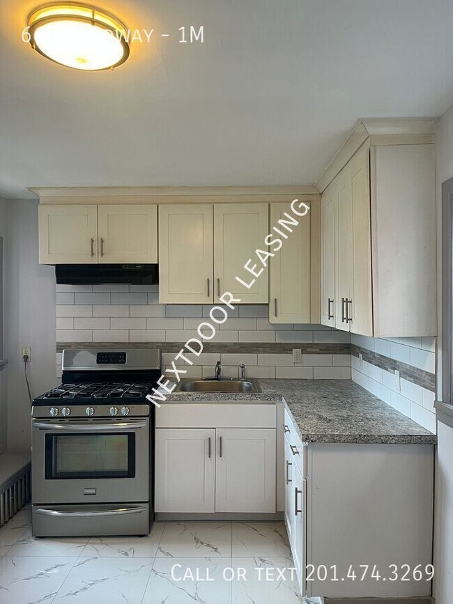 Building Photo - 66 Broadway-1M