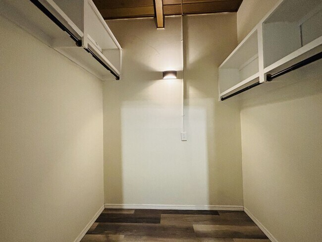 Building Photo - Quirky Mid-Century 3BR with High Beam Ceilings + Fenced Yard – $1,550