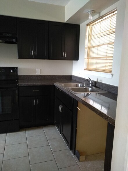 Building Photo - 6917 Alto Rey Ave Apt A