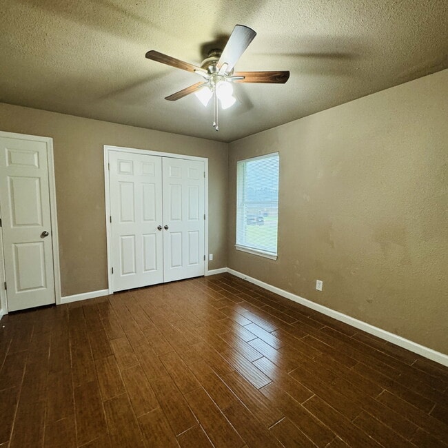 Building Photo - Welcome to Pine Shadows Duplex Apartment